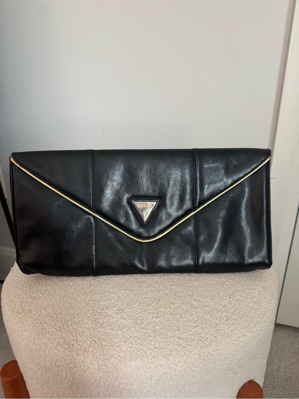 Guess Black Clutch with Gold Piping and Logo